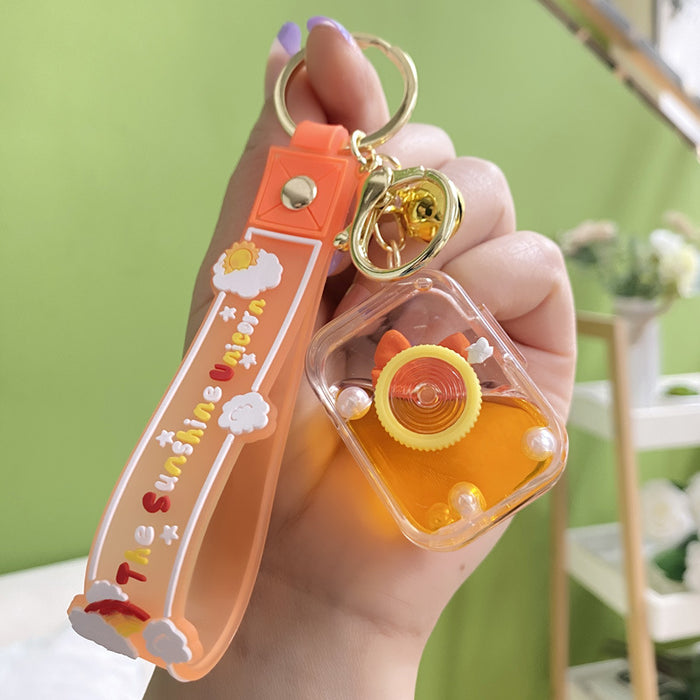 Wholesale Acrylic Oil in Camera Bow Floating Bottle Keychain JDC-KC-YanG057