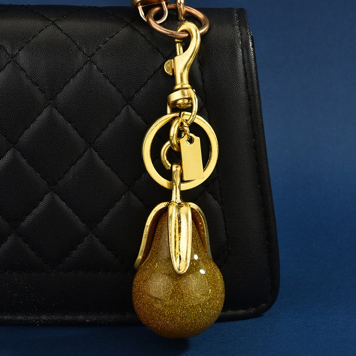 Wholesale Gilded pear-shaped couple keychains symbolizing eternal love
