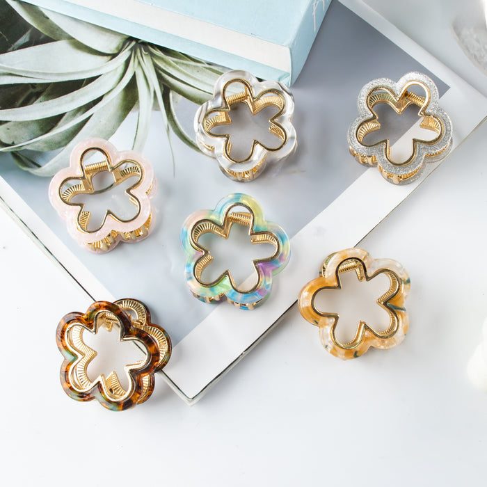 Wholesale Small flower shaped hair clip accessory with metal alloy grip