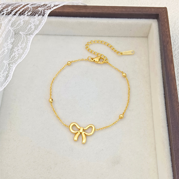 Wholesale Simple bow titanium steel necklace set