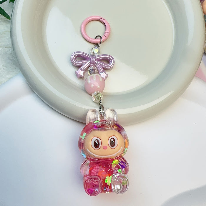 Wholesale Acrylic Cloth Quicksand Keychain Luminous Flash Cute Doll Bag Pendant Gift Keychain