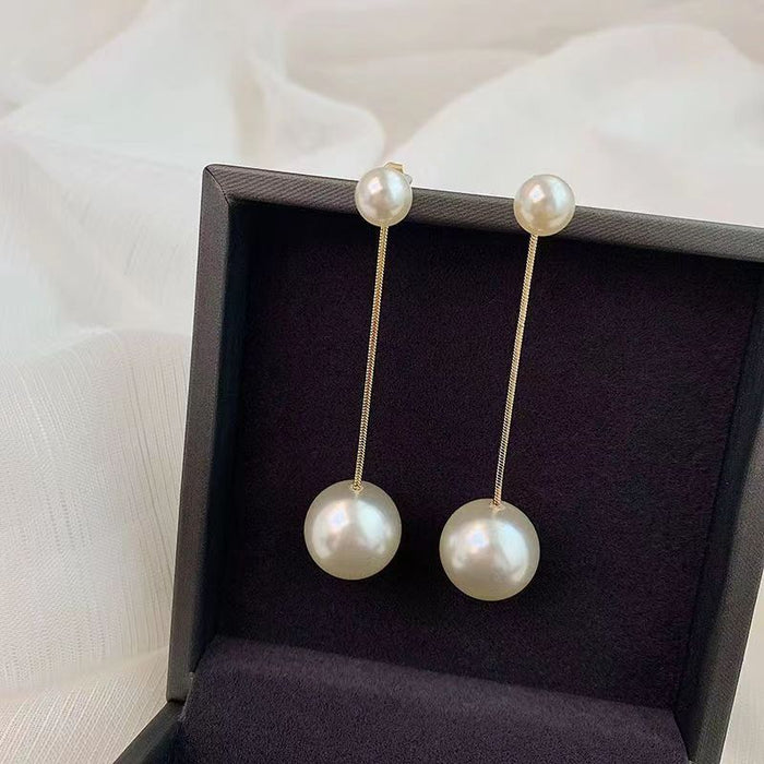 Wholesale Imitation pearl earrings for women tassel earrings long face slimming earrings