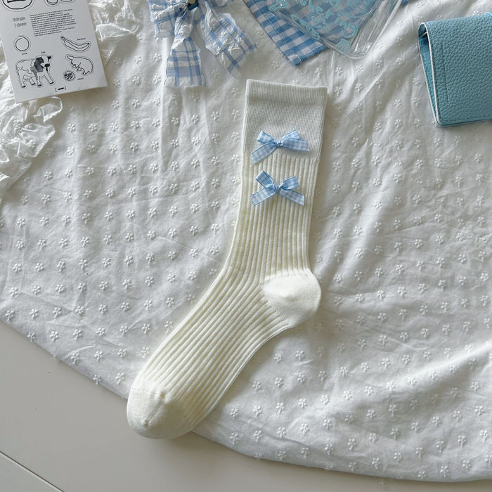 Wholesale Bow tie socks, long tube pile socks
