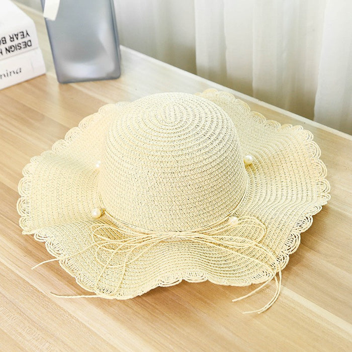 Wholesale Fashionable pearl woven straw hat, sun shading and sun protection hat, versatile