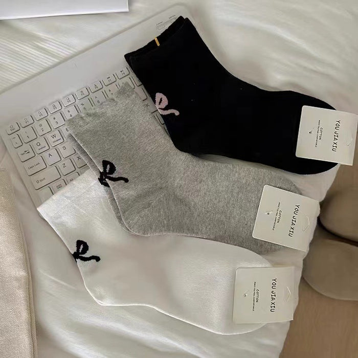 Wholesale Grey bow middle tube socks, pure cotton heel long tube pile socks