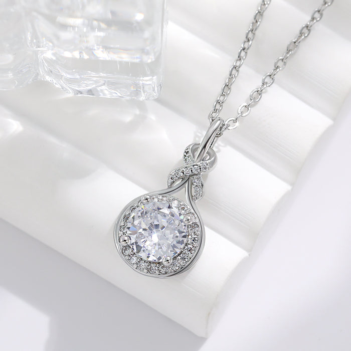 Wholesale Original Design: Light Luxury Waterdrop Set with Diamonds, Simple Circular Symmetrical Entangled Symbol Necklace