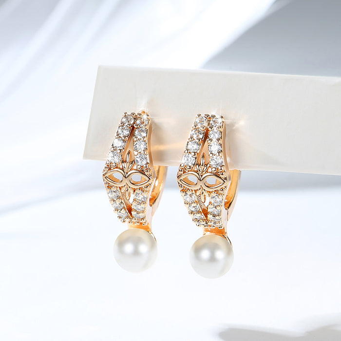 Wholesale Copper gold-plated retro light luxury simple pearl earrings, small and fashionable design, inlaid with zircon ear buckles, wholesale of ear accessories