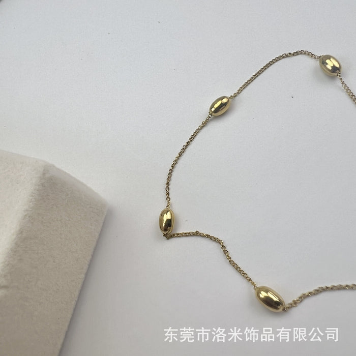 Wholesale Unique and niche gold bean bracelet with fashionable and minimalist design