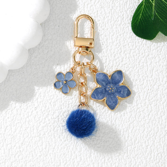 Wholesale Cute Cherry Blossom Flower Alloy Keychain Pendant Purple Decorative Accent for Resale