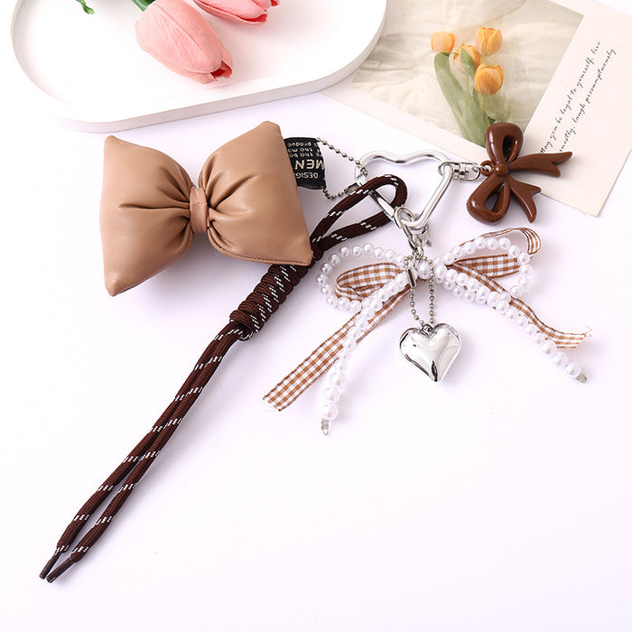 Wholesale Leather bow heart pendant luggage keychain lanyard accessories single buckle tassel pendant accessories
