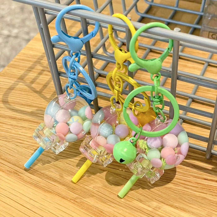 Wholesale Creative oil colored bead lollipop keychain cute cartoon car couple bag pendant small gift