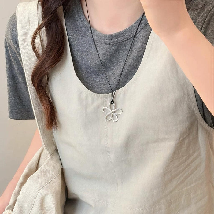 Wholesale Hollow flower necklace, simple black rope, adjustable neckchain, long and versatile collarbone chain