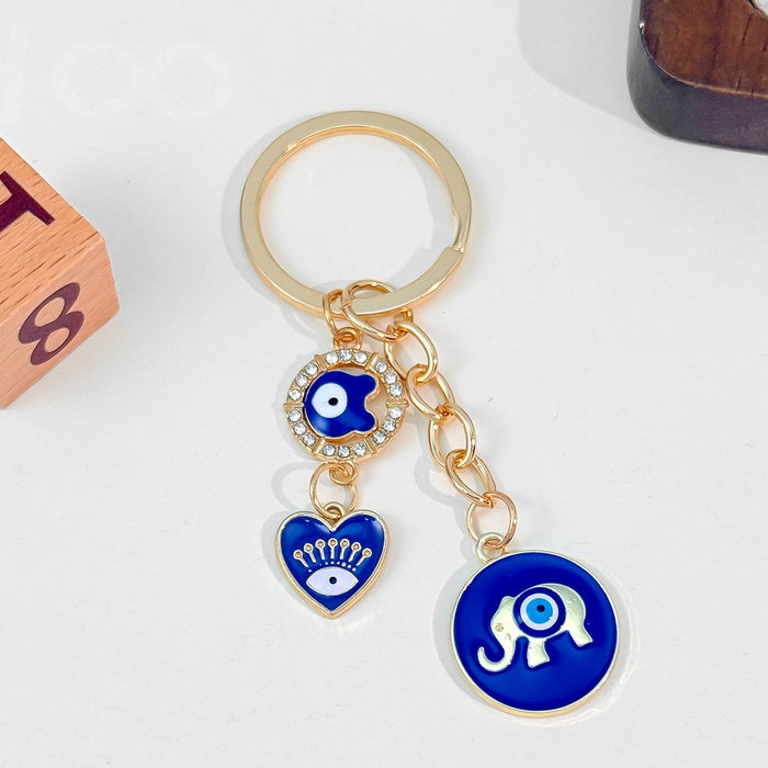 Wholesale Heart-Shaped Palm Water Drop Devil's Eye Pendant Keychain