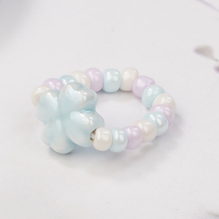 Wholesale New Ceramic Flower Ring Wholesale Student Versatile Handpiece