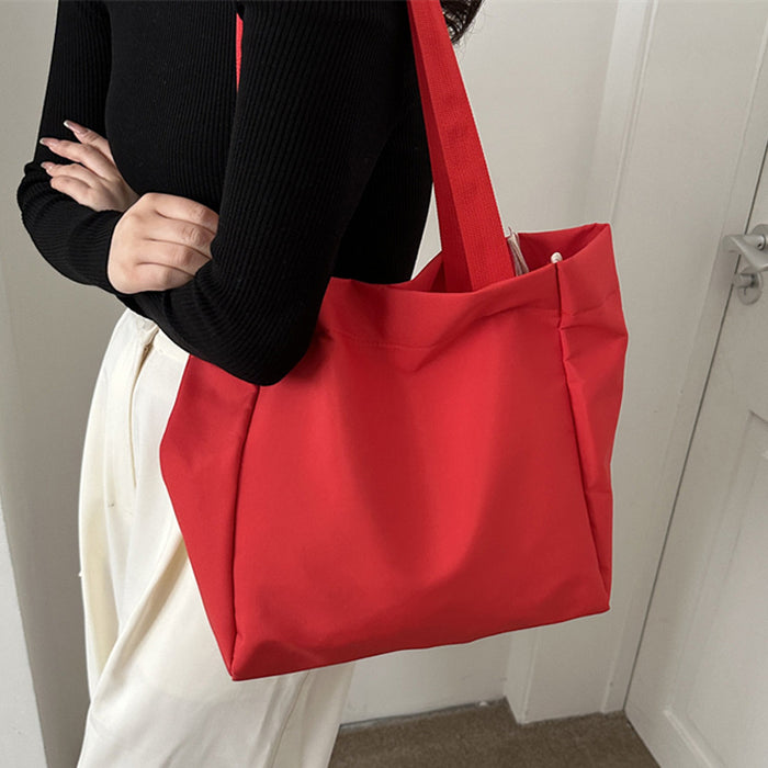 Wholesale Solid color large capacity canvas shoulder bag, simple commuting tote bag, shopping bag