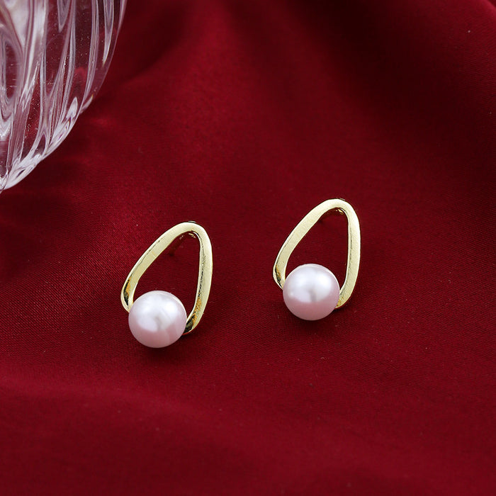 Wholesale Silver needle pearl earrings with simple and niche design, light luxury temperament, earring accessories
