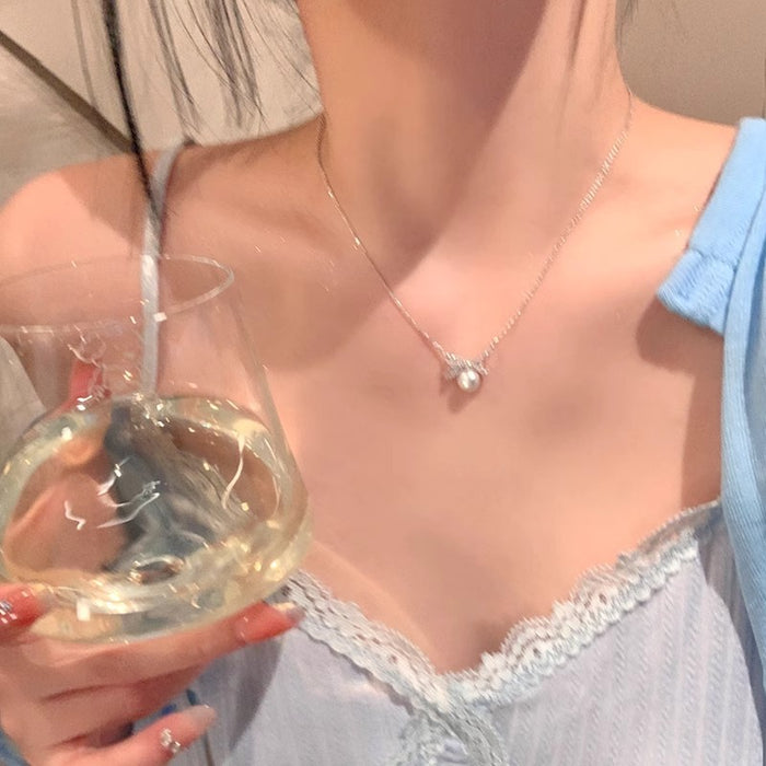 Wholesale Titanium steel pearl bow necklace, new high-end, light luxury collarbone chain accessory