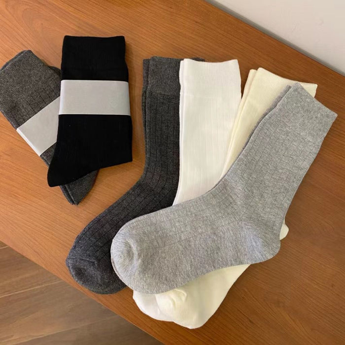 Wholesale Fashionable boneless pile socks with vertical stripe design, versatile and slimming, modified legs, retro style