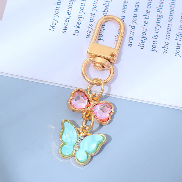 Wholesale Keychain Pendant Creative Alloy Butterfly Headphone Mobile Phone Bag Pendant