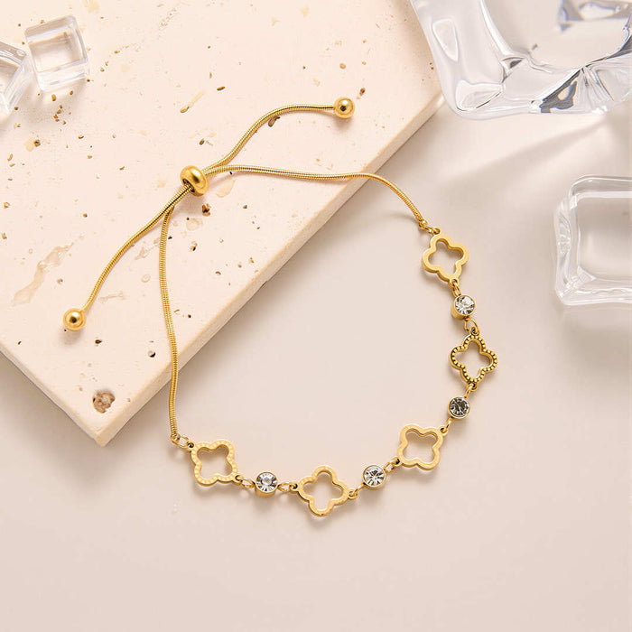 Wholesale New hollowed out clover pull-out bracelet made of titanium steel with diamonds, niche high-end handmade accessories wholesale