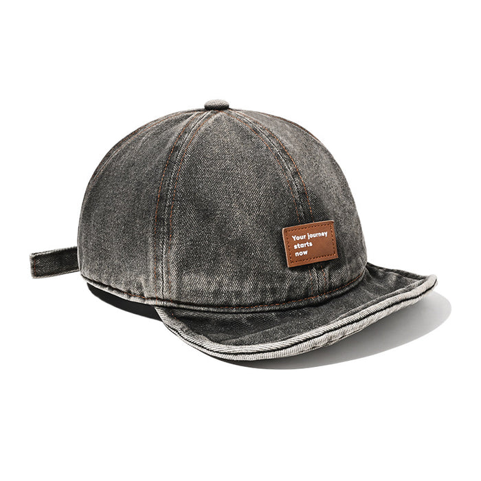 Wholesale Retro soft top baseball cap washed with water, short brimmed duckbill cap made of old leather label hat