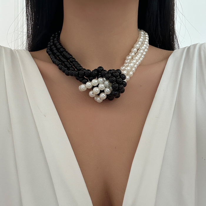 Wholesale Fashionable trend multi-layer imitation pearl necklace, artistic retro black and white color matching, high-end feeling pearl collar