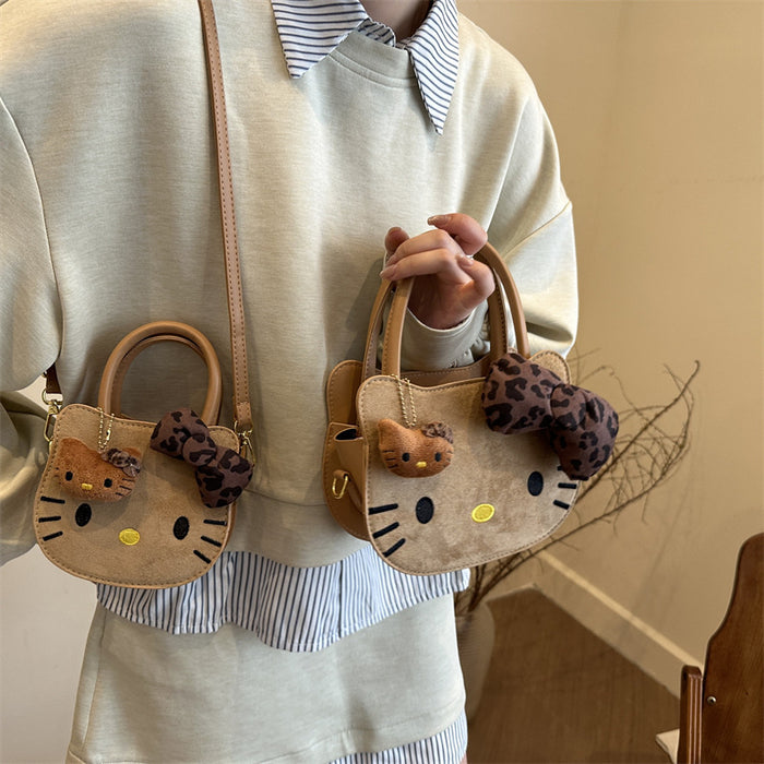 Wholesale Cute cartoon shoulder bag with leopard print bow.