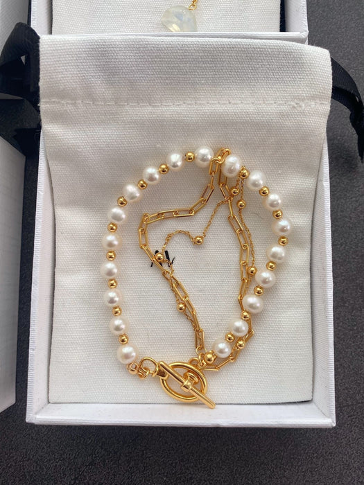 Wholesale Pearl necklace for women, light luxury, niche design, high-end feeling, collarbone chain, retro necklace, sweater chain, accessory