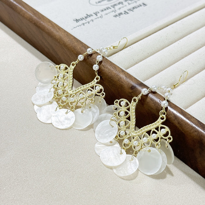 Wholesale Vintage shell pearl tassel earrings, exaggerated, luxurious, high-end, niche earrings