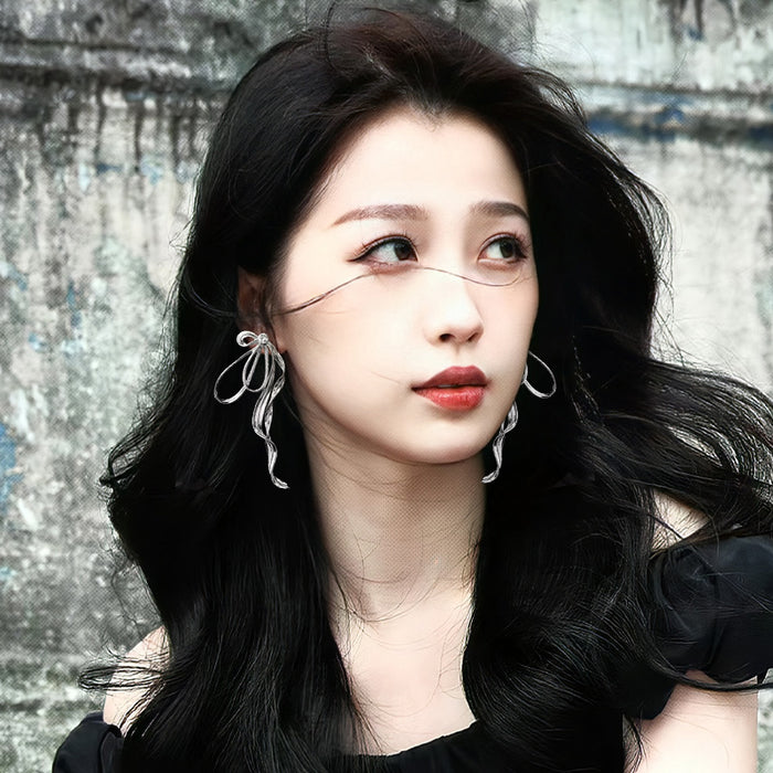 Wholesale Butterfly knot ear clip without ear hole, niche exaggerated earrings and earrings