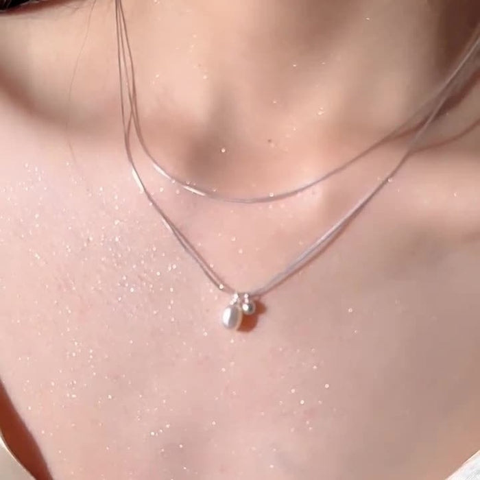 Wholesale Simple double-layer stacked natural pearl necklace, fashionable and personalized collarbone chain, versatile and high-end