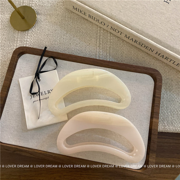 Wholesale Pink semi-circular hair clip with shark clip at the back of the head, versatile hair accessory