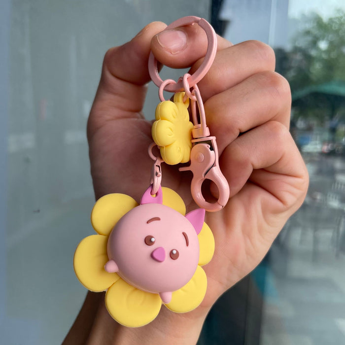 Wholesale Rotating keychain, cute doll bag pendant, hanging decoration, car keychain, smiling face style