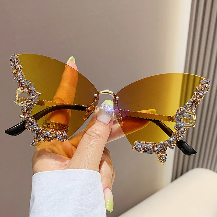 Wholesale New butterfly studded diamond rimless sunglasses with fashionable and exaggerated personality