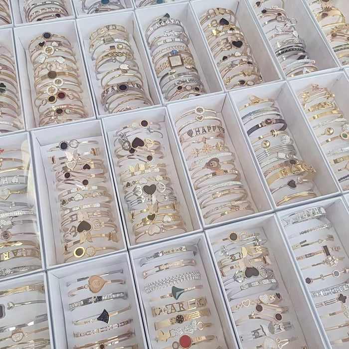 Wholesale Titanium steel bracelet with inlaid rhinestones,  style will be shipped randomly.