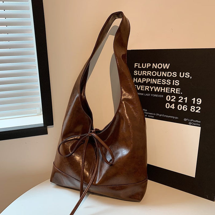 Wholesale Small commuting bag, versatile leisure bag, bow tie, large capacity single shoulder underarm tote bag