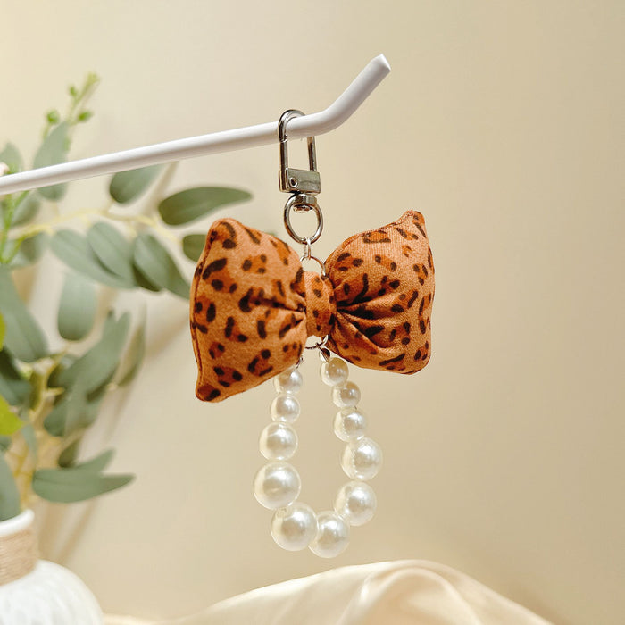 Wholesale Pearl Puff Bow Girl Keychain Cute All-match Mobile Phone Chain Bag Pendant
