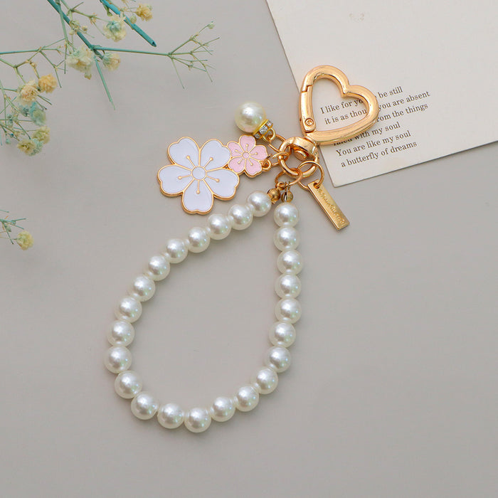 Wholesale Flower Pearl Pendant Keychain Girl Beaded Mobile Phone Chain Headset Bag Pendant