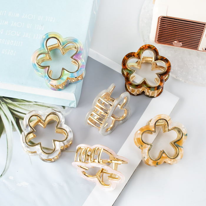 Wholesale Small flower shaped hair clip accessory with metal alloy grip