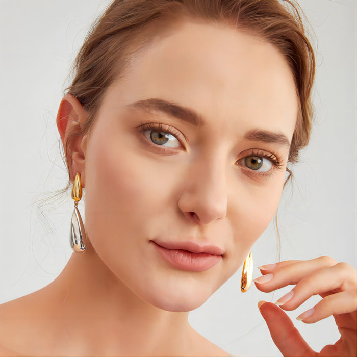 Wholesale Water droplet earrings, female stainless steel hollow three-dimensional double water droplet earrings jewelry