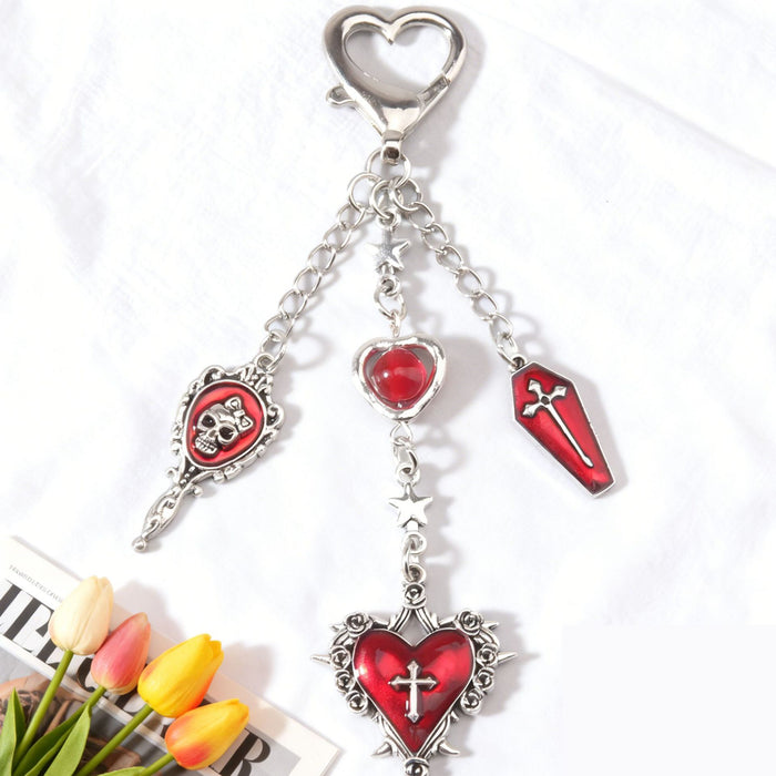 Wholesale Y2K Dark Style Cross Raccoon Butterfly Arrow Through Heart Keychain Pendant Zinc Alloy Boutique Resale Accessory