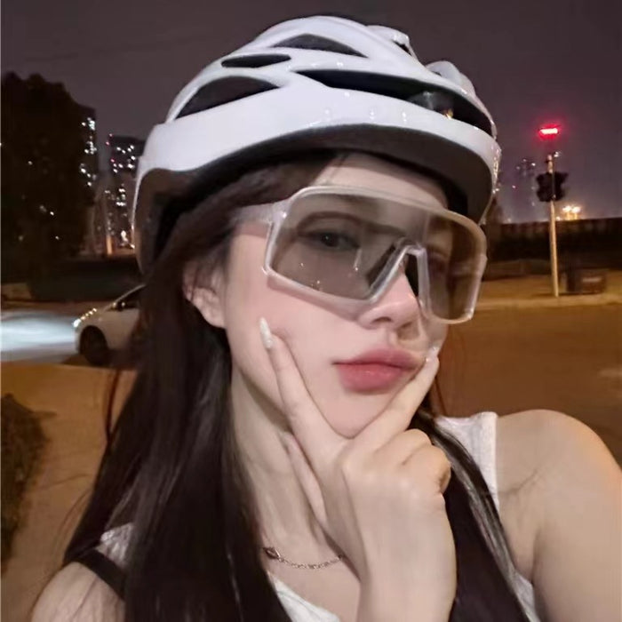 Wholesale Transparent color changing cycling glasses, fashionable polarized sunglasses, windproof outdoor sports sunglasses