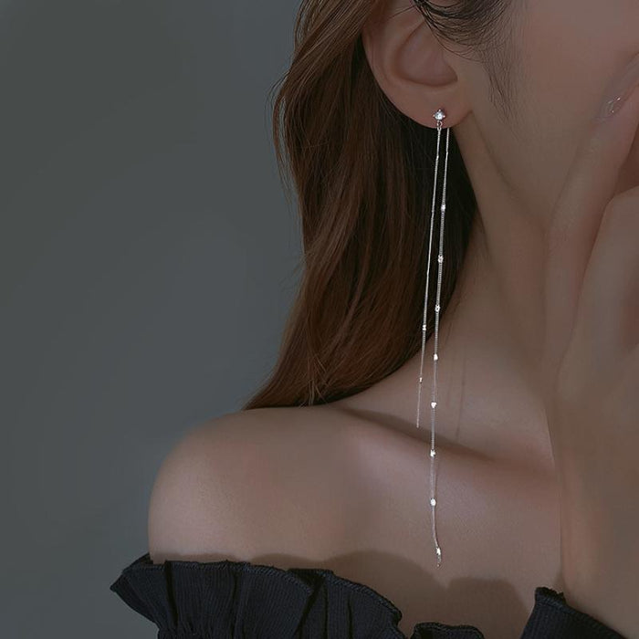 Wholesale Pure silver long tassel earrings, niche, high-end, temperament, ear string, earring chain