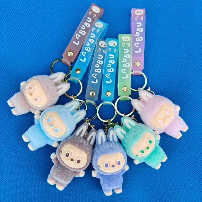 Wholesale LED light-up keychain,  cartoon bucktooth doll,  school bag pendant,  flocking doll