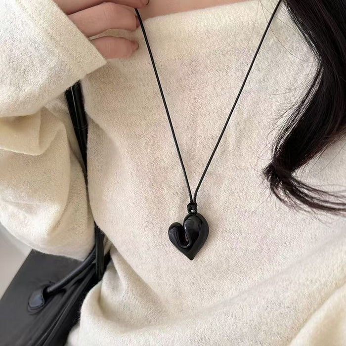 Wholesale Love necklace with high-end feel, black rope hanging neck, sweater chain, adjustable drawstring accessory