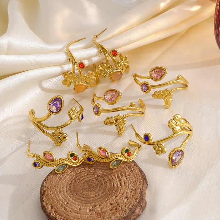 Wholesale Gold titanium steel earrings inlaid with colorful horse eye zircon stainless steel earrings, female hollow leaf C-shaped earrings