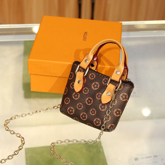 Wholesale High end printed shell small bag, exquisite and niche, portable, carry on hand, diagonally crossing coin purse