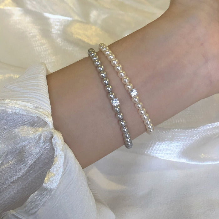 Wholesale pearl simple commuter flash bracelet easy to wear elastic bracelet female