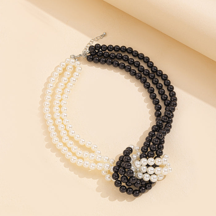 Wholesale Fashionable trend multi-layer imitation pearl necklace, artistic retro black and white color matching, high-end feeling pearl collar