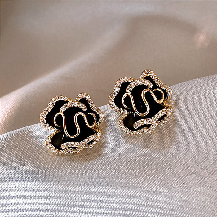 Wholesale Camellia earrings, pure silver needle earrings, niche design, high-end feel